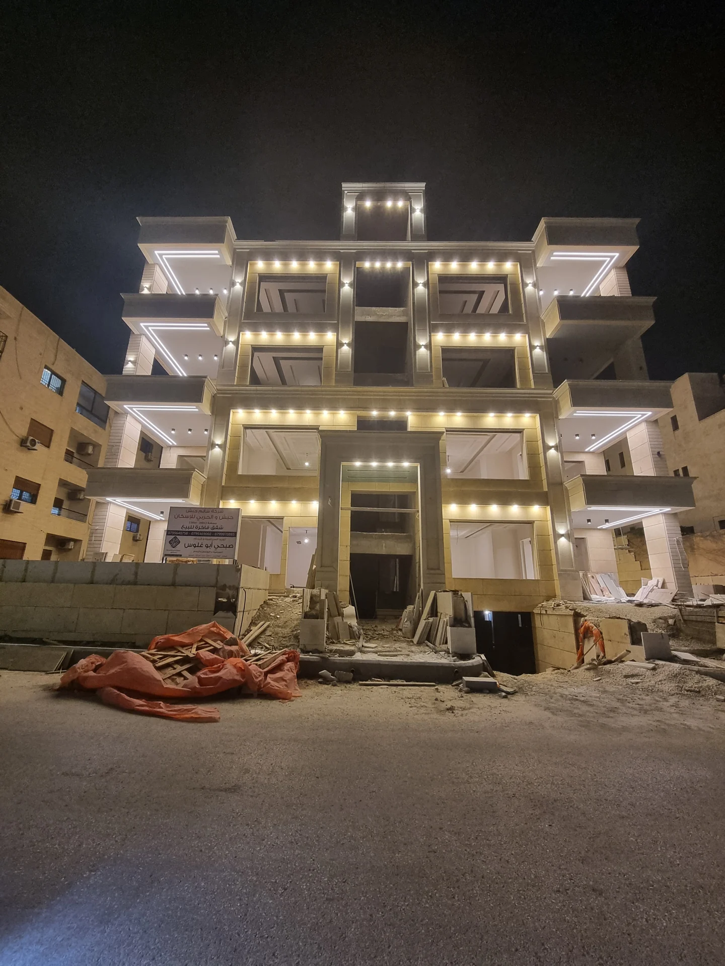Residential facade at night · واجهة سكنية ليلًا